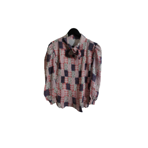 A playful, Retro Patchwork Top With Puff Sleeves