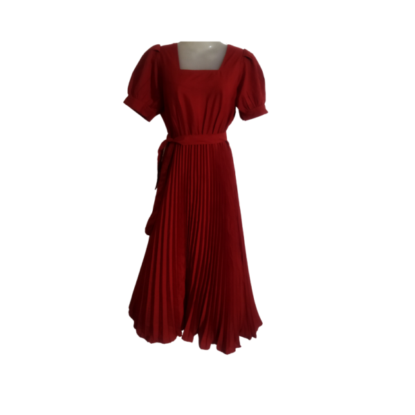 Effortless Elegance In This Pleated Midi Dress